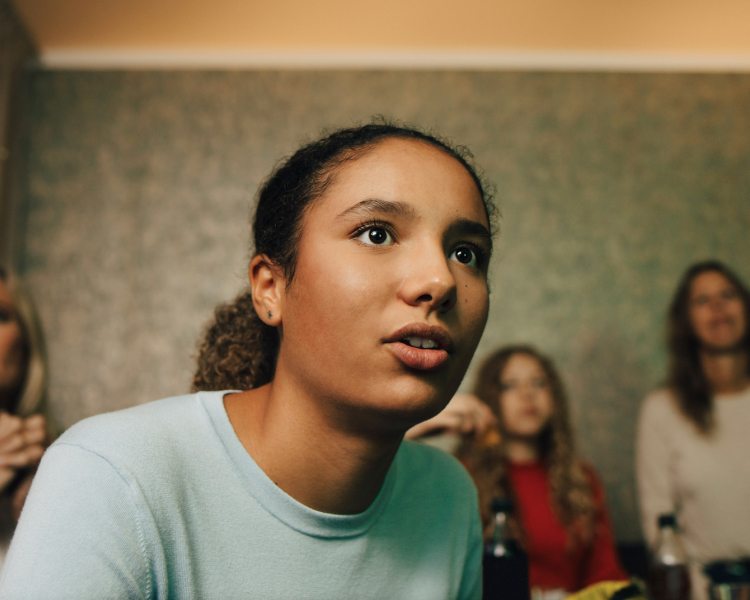 Woman is curiously looking up