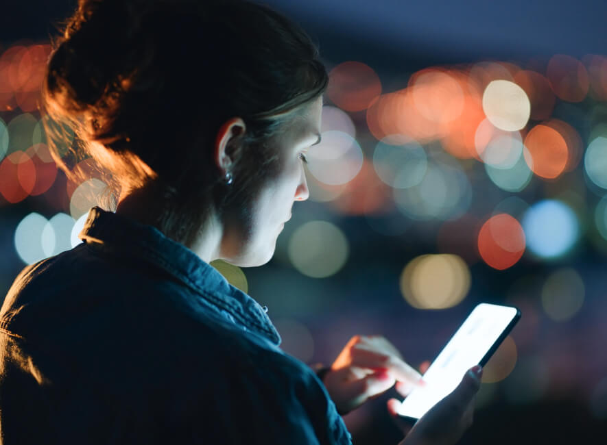 Woman looking at her cell phone