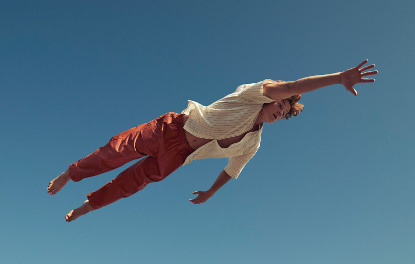 Man flies through the sky